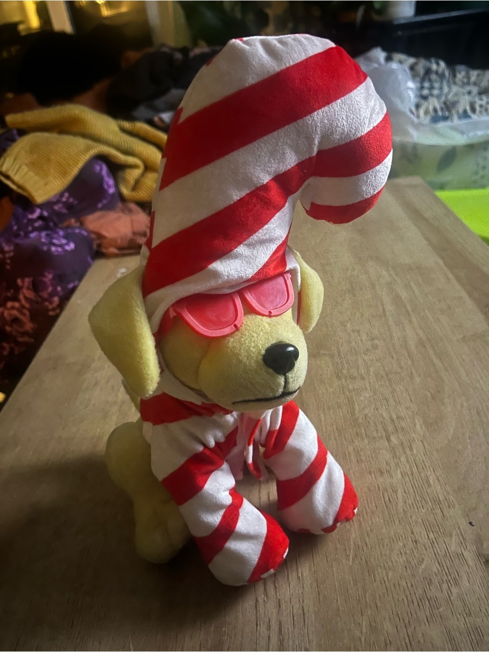 Yellow Plush Dog with Red & White Striped Hat and Sunglasses